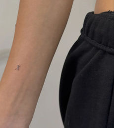 Get Inked in Style: Fine-Line Tattoo Session image 10