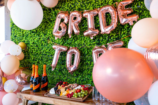 Pre-Arrival Party Setup With Balloon Arch, Sparkling Wine and Charcuterie Board image 8