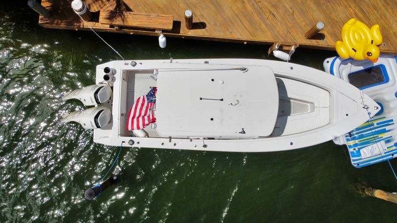 Jupiter Luxury BYOB 33ft Party Boat with Captain, LED Speaker Lights, Sea Deck, Vinyl Seats & Jet-Ski Add-Ons image 15