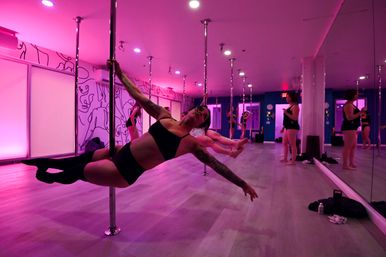 Beginner-Friendly Pole Dancing Class with LED Lighting and Massive Sound System image 7