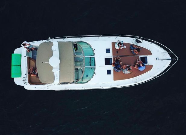Luxury BYOB Party Yacht Charter with Suntanning Deck, Lily Pads, Sand Bars and More image 12