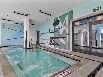 Bay Views, Rooftop Pool & Downtown Vibes image 7