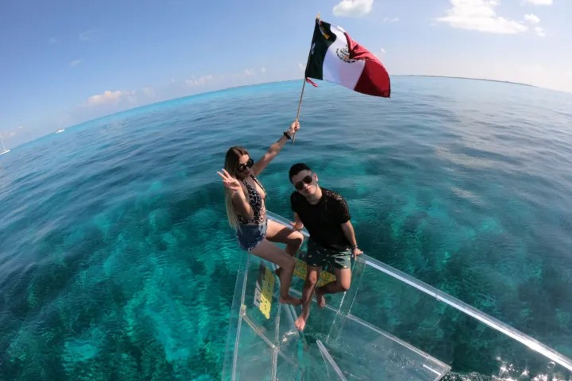 Cancún Colors Private or Public Boat Tour: Experience the Caribbean from a Transparent Boat image 1