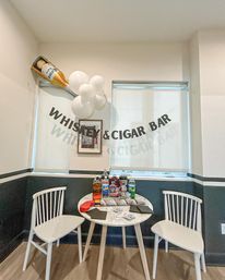 Bachelor-Themed Bar Set Up with Personalized Banner, Party Supplies, Games, Booze & More image 9