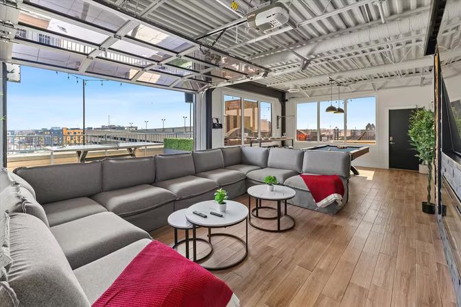 Skyline Penthouse: Hot Tub, Fire Pit + Rooftop Patio in the Heart of Downtown image 9