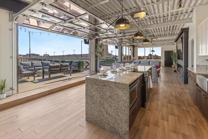 Skyline Penthouse: Hot Tub, Fire Pit + Rooftop Patio in the Heart of Downtown image 12
