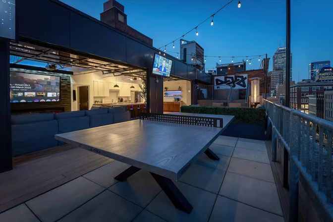 Skyline Penthouse: Hot Tub, Fire Pit + Rooftop Patio in the Heart of Downtown image 27