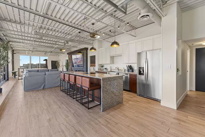 Skyline Penthouse: Hot Tub, Fire Pit + Rooftop Patio in the Heart of Downtown image 11