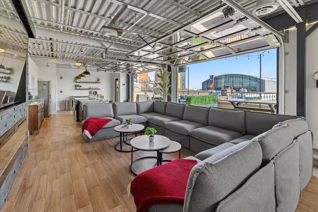 Skyline Penthouse: Hot Tub, Fire Pit + Rooftop Patio in the Heart of Downtown image 3