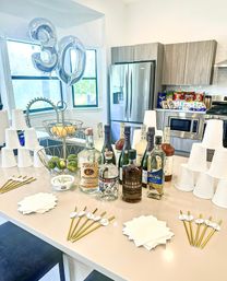 Bachelor-Themed Bar Set Up with Personalized Banner, Party Supplies, Games, Booze & More image 5