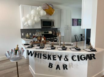 Bachelor-Themed Bar Set Up with Personalized Banner, Party Supplies, Games, Booze & More image 7