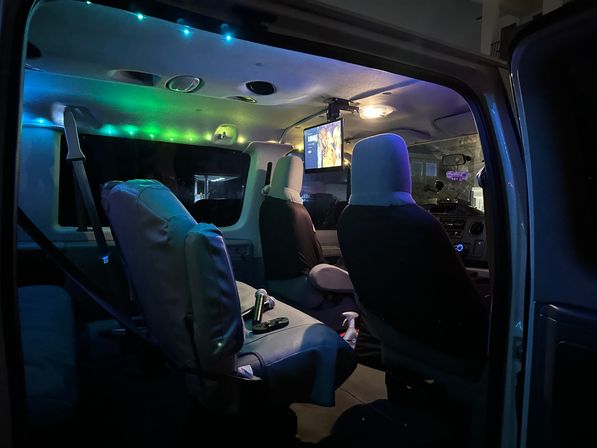 Wild 24/7 Party Bus: Party & Ride with Karaoke, Lights, & Luggage Space image 3