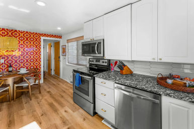Stay Groovy: Photo-Worthy Rental with Retro Vibes, Arcade Games & Turf Yard Fun image 9