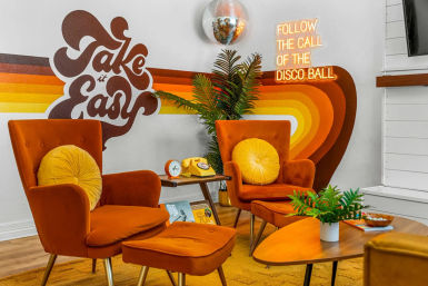 Stay Groovy: Photo-Worthy Rental with Retro Vibes, Arcade Games & Turf Yard Fun image 1