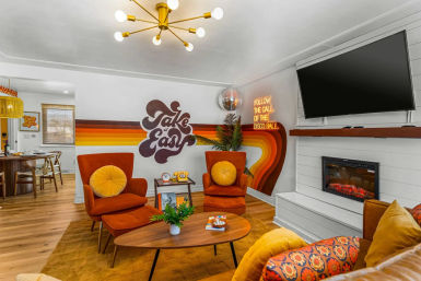 Stay Groovy: Photo-Worthy Rental with Retro Vibes, Arcade Games & Turf Yard Fun image 2
