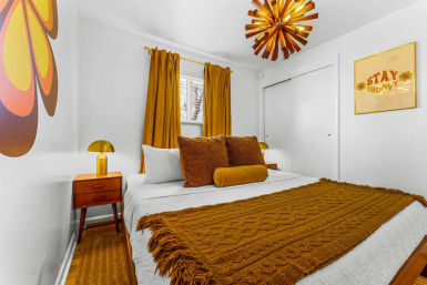 Stay Groovy: Photo-Worthy Rental with Retro Vibes, Arcade Games & Turf Yard Fun image 13