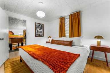 Stay Groovy: Photo-Worthy Rental with Retro Vibes, Arcade Games & Turf Yard Fun image 14
