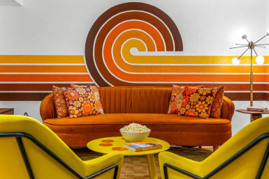 Stay Groovy: Photo-Worthy Rental with Retro Vibes, Arcade Games & Turf Yard Fun image 3