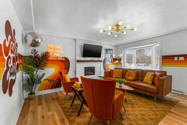 Stay Groovy: Photo-Worthy Rental with Retro Vibes, Arcade Games & Turf Yard Fun image 4