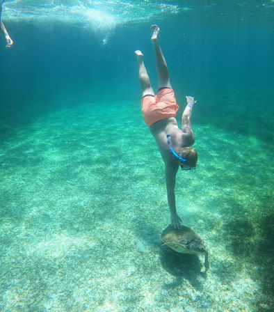 Snorkel, Swim & Sip: Private 40' Boat Adventure to Rose Island image 2