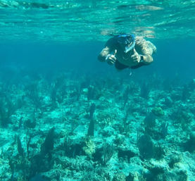 Snorkel, Swim & Sip: Private 40' Boat Adventure to Rose Island image 3