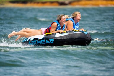 All-Day Private Pontoon Charter on Douglas Lake with Skis, Wakeboards, and Tubes (8-Hours) image 6