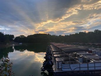 All-Day Private Pontoon Charter on Douglas Lake with Skis, Wakeboards, and Tubes (8-Hours) image 5