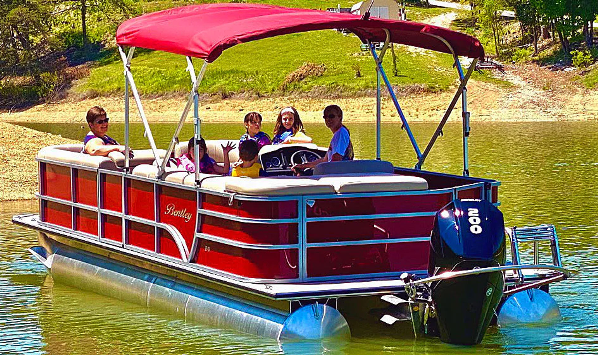 All-Day Private Pontoon Charter on Douglas Lake with Skis, Wakeboards, and Tubes (8-Hours) image 1