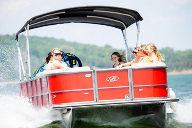 All-Day Private Pontoon Charter on Douglas Lake with Skis, Wakeboards, and Tubes (8-Hours) image 3