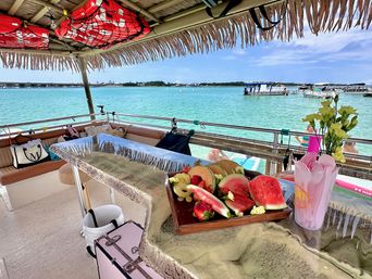 The Pink Dolphin: Private Crab Island Tiki Charter (Up to 18 People) image 14