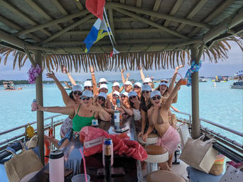 The Pink Dolphin: Private Crab Island Tiki Charter (Up to 18 People) image 5