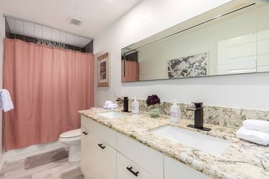 Love Oasis II: Luxury Vacation Home with Pool + Spa, Chic Decor & Secret Photo Booth image 30