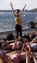 Boat Yoga Aboard an Insta-Worthy Pink Party Barge with Yoga Mats & Complimentary Mimosas Included image 1