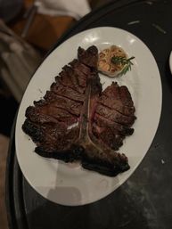 Private Chef Party at Your Rental: Complete Interactive Steakhouse Dining Experience & Show with Dry-Aged Steaks, Champagne Gun & More (BYOB) image 4