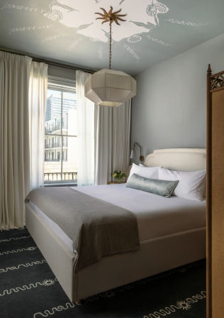Hotel Perle: Luxurious Boutique Hotel with Multi-Room Suites & Rooftop Pool image 12