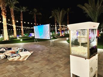 Poolside Cinema: Movie Night by The Pool with Floaties, Popcorn Machine, Projector/Speaker & Snacks All Included image 2
