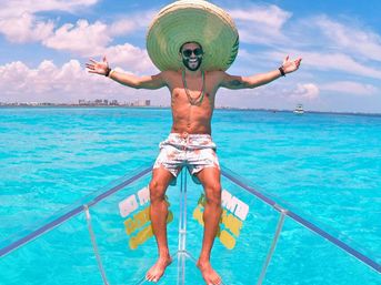Cancun Clear Boat Tour: Explore the Caribbean Reef on a 100% Transparent Boat image