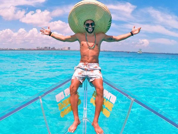 Cancun Clear Boat Tour: Explore the Caribbean Reef on a 100% Transparent Boat image 1