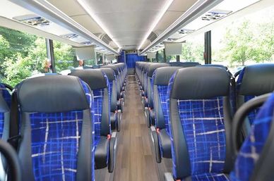 The Ultimate Rolling Rendezvous: 56-Passenger Motor Coach with Optional Drink Packages image 2