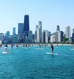 Paddle Board Experience on Lake Michigan Overlooking City Views image 4