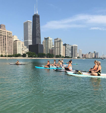 Paddle Board Experience on Lake Michigan Overlooking City Views image 3