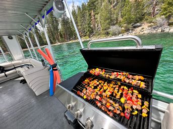 Double Decker Party Barge Charter with Propane Grills, Lilly Pad, Waterslides & More at Tahoe Keys Marina (BYOB) image 6