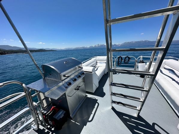 Double Decker Party Barge Charter with Propane Grills, Lilly Pad, Waterslides & More at Tahoe Keys Marina (BYOB) image 2