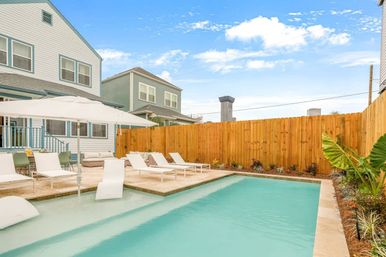 Hip Art-Filled Uptown Oasis with Heated Pool and Parking image 4