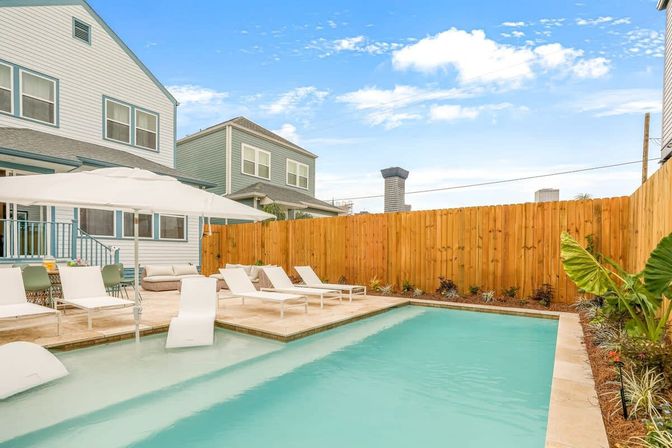 Hip Art-Filled Uptown Oasis with Heated Pool and Parking image 4