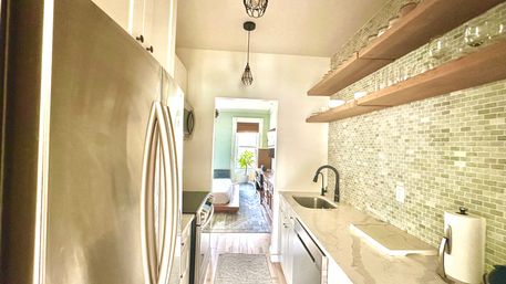 Penthouse Duplex with Spa Bathroom & Movie Theater Living Room image 23