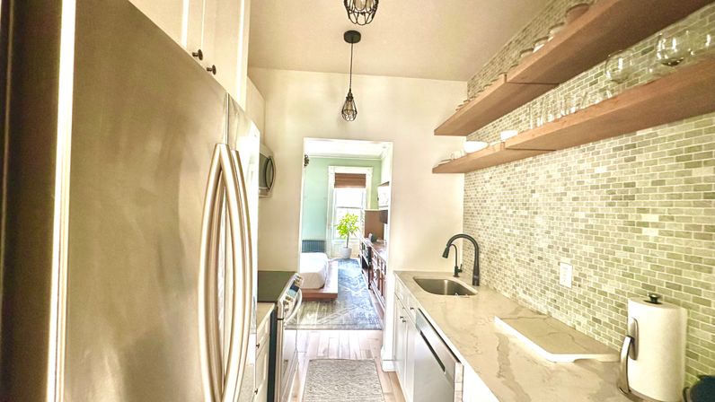 Penthouse Duplex with Spa Bathroom & Movie Theater Living Room image 23