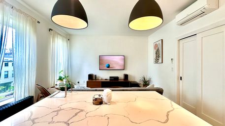 Penthouse Duplex with Spa Bathroom & Movie Theater Living Room image 12
