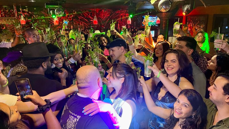 Salsa Dancing and Bachata Lessons with Mojitos, Live Music, Appetizers, and Complimentary Pass to Mango’s! image 6