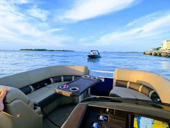 Cruise, Snorkel & Chill: 22' Bennington Tritoon Boat Charter for 10 Guests image 2